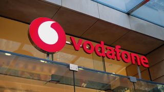 Vodafone logo outside a store in Sydney