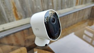 Arlo Pro 4 security camera placed on a table