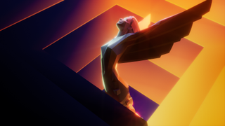 A Game Awards statue on an orange and purple hued background.