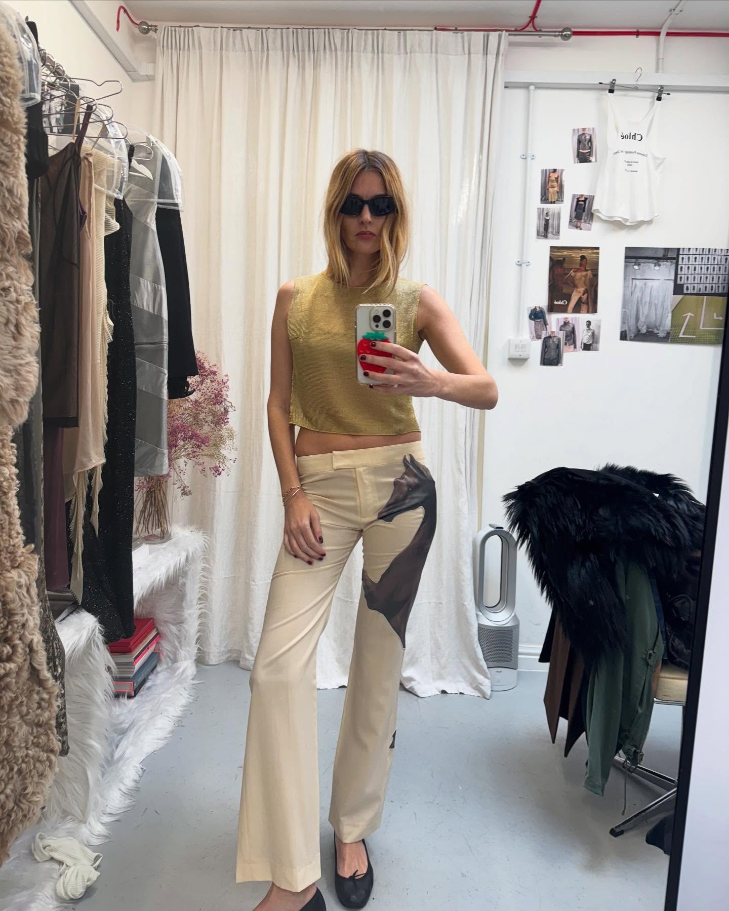 Camille Charriere in cut flare pants