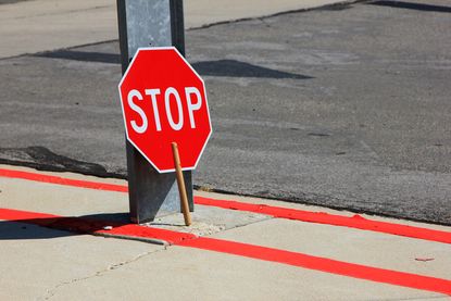 A crossing guard's sign.