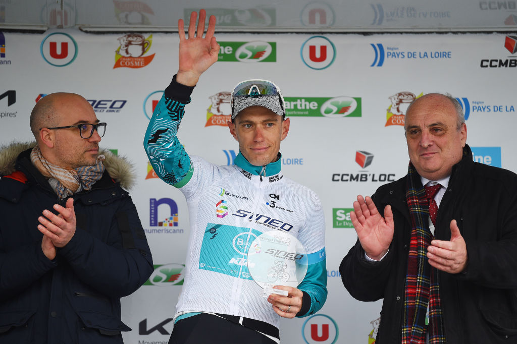 LE LUDE FRANCE APRIL 06 Pierre Rolland of France and Team BB Hotels PB Ktm celebrates winning the trophy for the most combative rider on the podium ceremony after the 68th Circuit Cycliste Sarthe Pays de la Loire 2022 Stage 2 a 1747km stage from Le Lude to Le Lude CircuitSarthe on April 06 2022 in Le Lude France Photo by Dario BelingheriGetty Images