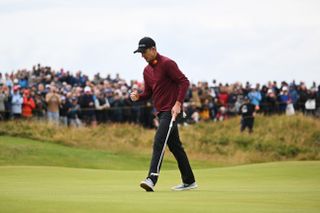 Justin Rose celebrates holing a putt at The Open