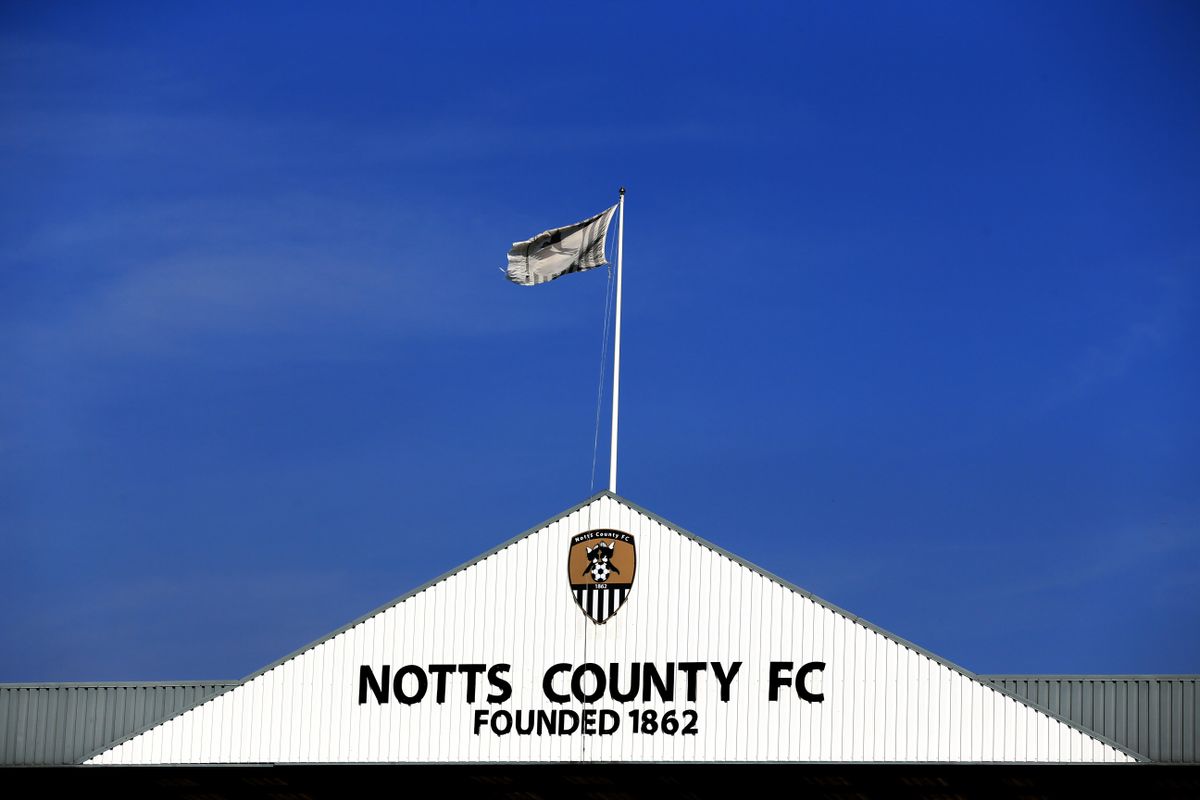 Notts County club crest, name and foundation date on a stand at the club's Meadow Lane stadium