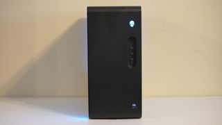 An Alienware Aurora gaming desktop on a desk seen from the front