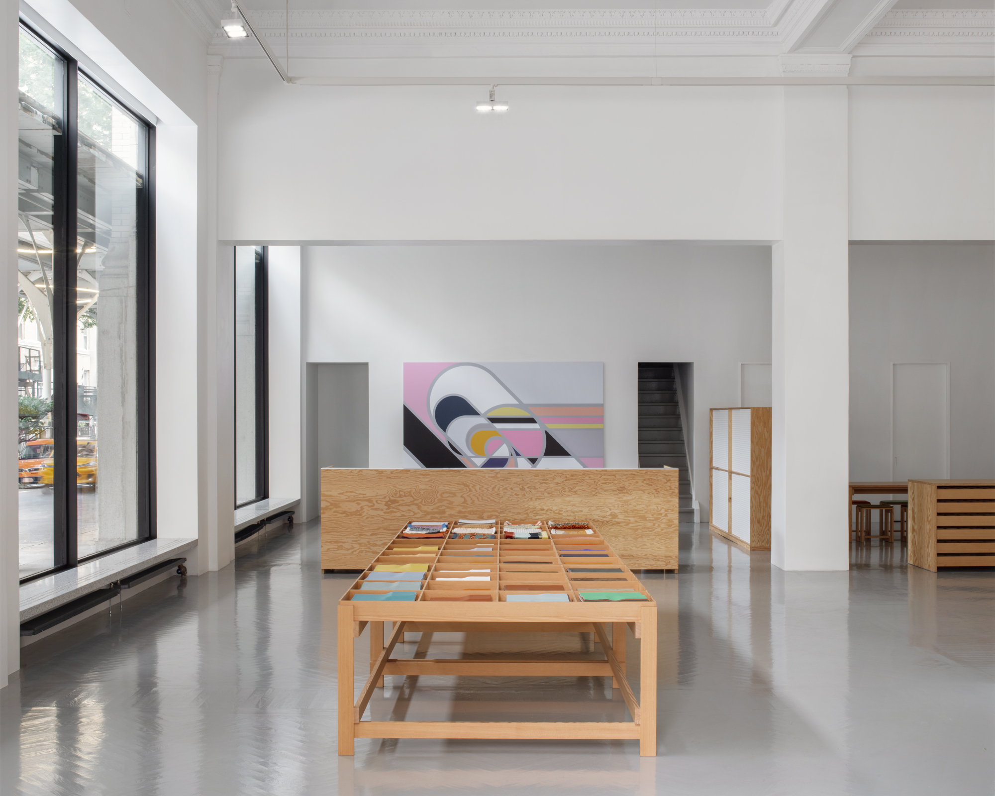 A wooden display table inside Maharam&#039;s NYC showroom.