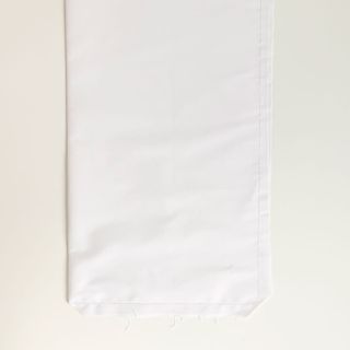 white hemmed fabric