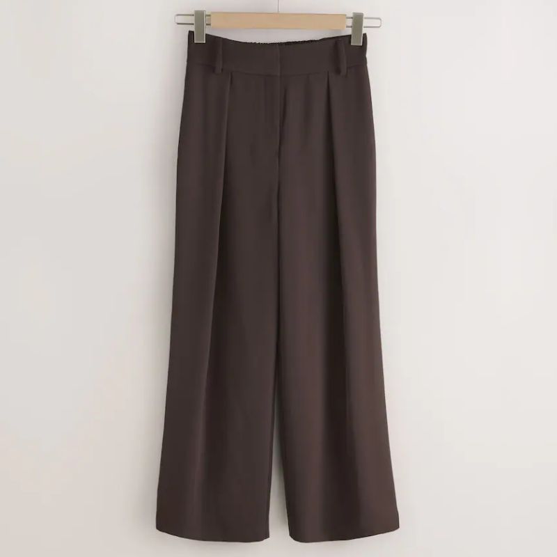 Next, brown tailored trousers