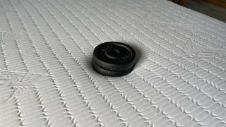Using 5kg weights to measure pressure relief for our REM-Fit Pocket 1000 mattress review