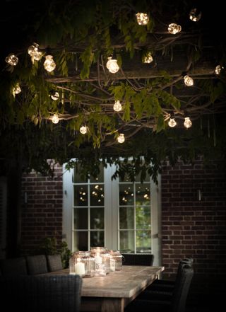 festoon light ideas: festoon lighting above table