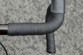 Kinesis 4 seasons bar tape wrapped on a road drop handlebar in black