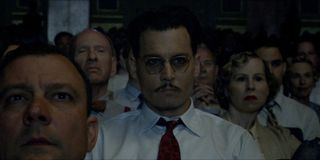 Public Enemies Johnny Depp sitting in the theater