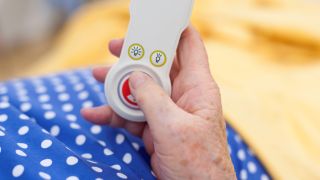 Senior citizen uses medical call button