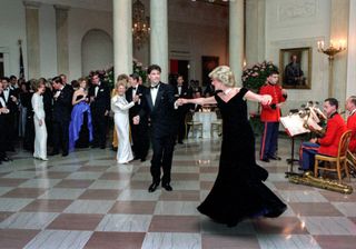 Princess Diana wears an off the shoulder gown at the White House in 1985