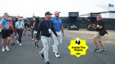 Bryson DeChambeau makes his way off site at Royal Birkdale at the end of day two of The Open in 2026