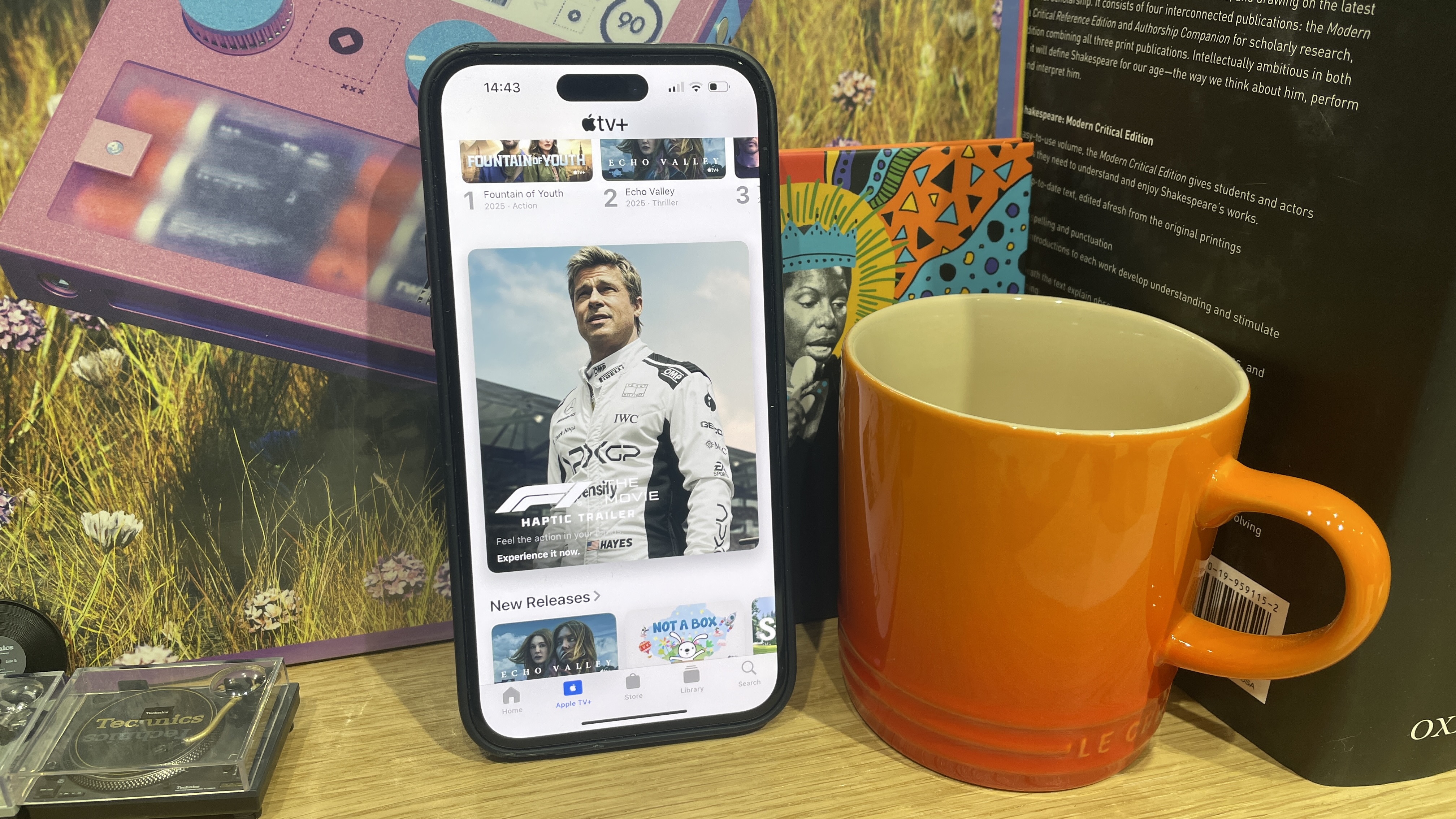 Apple's App Store menu on an iPhone advertising the F1 the Movie haptic trailer