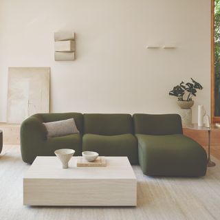 King Living 1977 Package 3 chaise sofa in green in a living room