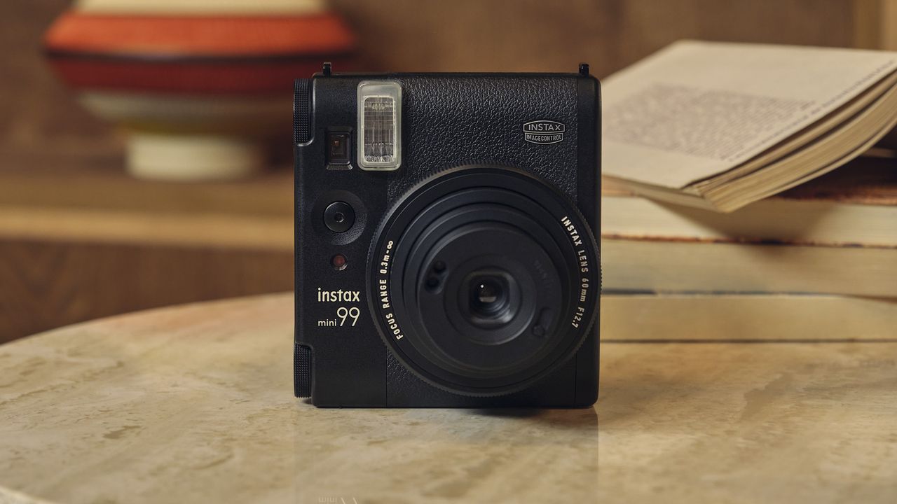 Fujifilm Instax Mini 99 on a marble table