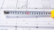 tape measure and floor plan