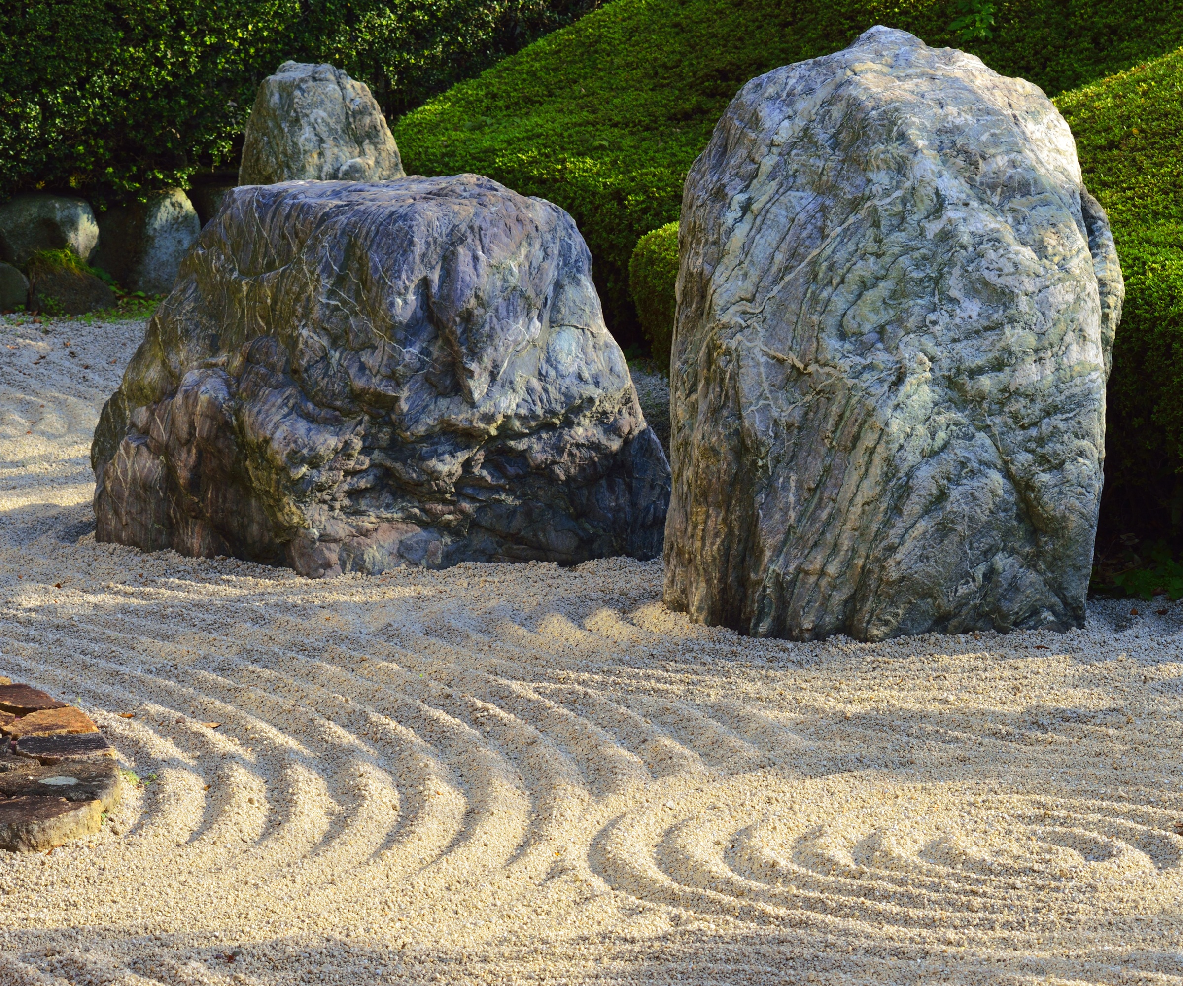 Zen garden, boulders, raked gravel