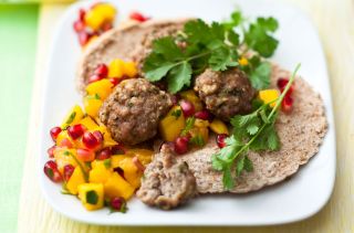 Meals under 300 calories: Pork pittas with mango and pomegranate salsa