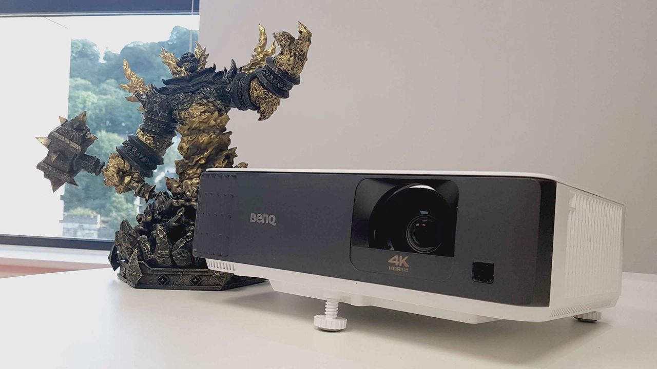 Benq TK700STi projector front view with WoW boss to the left