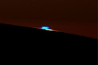 A blue flash of the sun appears more rarely than the green flash optical phenomenon. This image was taken from the Paranal Residencia. The intense blue, with purple edges, prove the phenomenon is real, not an optical illusion.