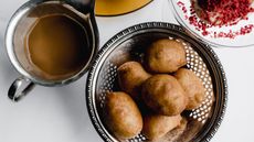 puffy fried dough balls, served with a super-sweet dulce de leche flavoured with coffee