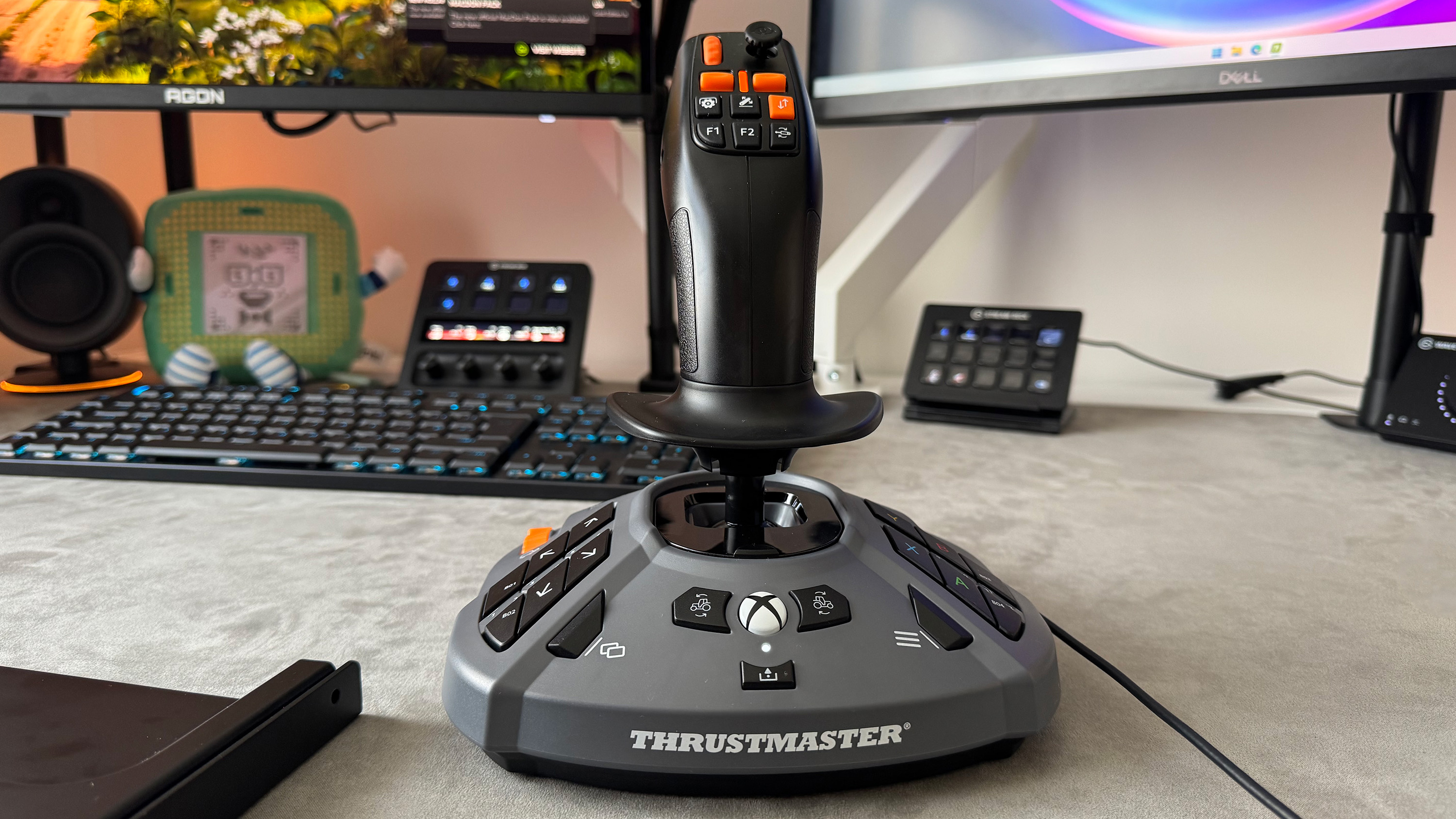 The Thrustmaster SimTask Farmstick on a desk
