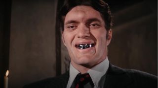 Richard Kiel flashes his metal teeth in The Spy Who Loved Me.