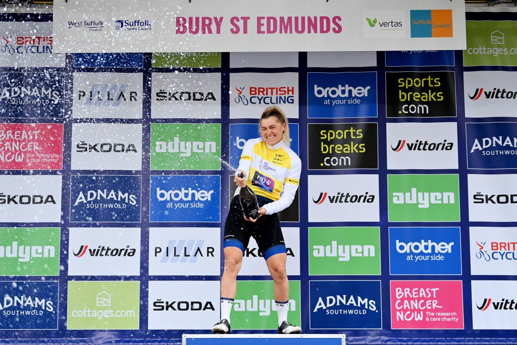 BURY ST EDMUNDS ENGLAND JUNE 06 Clara Copponi of France and Team FDJ Nouvelle Aquitaine Futuroscope celebrates winning the yellow leader jersey on the podium ceremony after the 8th The Womens Tour 2022 Stage 1 from Colchester to Bury St Edmunds WomensTour UCIWWT on June 06 2022 in Bury St Edmunds England Photo by Justin SetterfieldGetty Images
