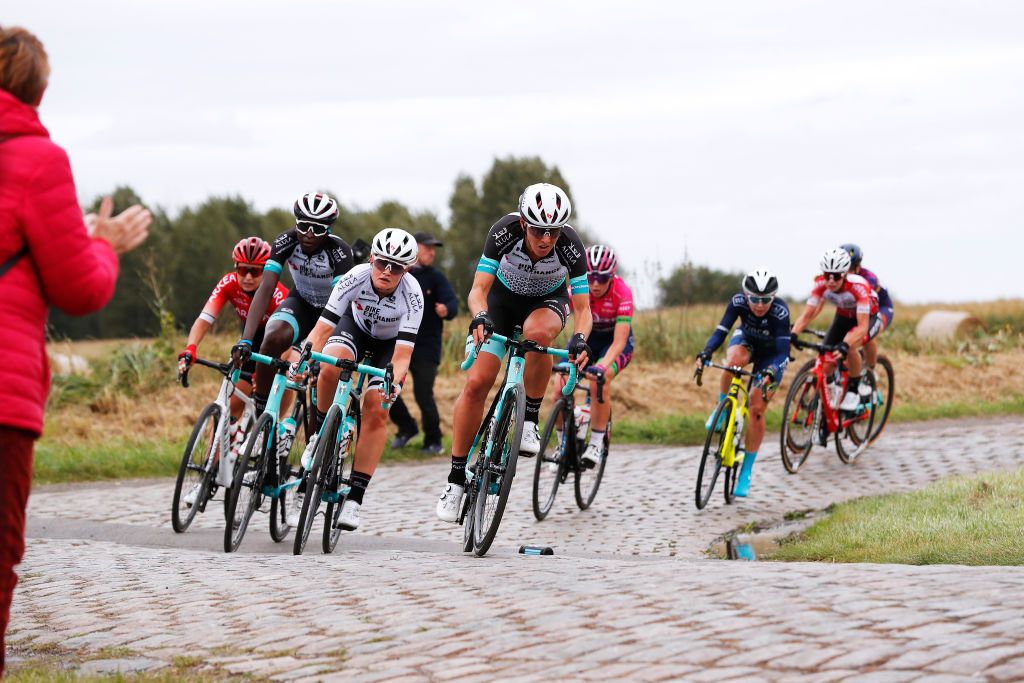 ROUBAIX FRANCE OCTOBER 02 LR Teniel Campbell of Trinidad and Tobago Georgia Williams of New Zealand and Janneke Ensing of Netherlands and Team BikeExchange compete through Hornaing Wandignies cobblestones sector during the 1st ParisRoubaix 2021 Womens Elite a 1164km race from Denain to Roubaix ParisRoubaixFemmes ParisRoubaix on October 02 2021 in Roubaix France Photo by Bas CzerwinskiGetty Images