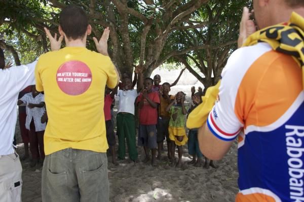 Koos Moerenhout and Maarten Tjallingii (both Rabobank) dance and sing with Right to Play