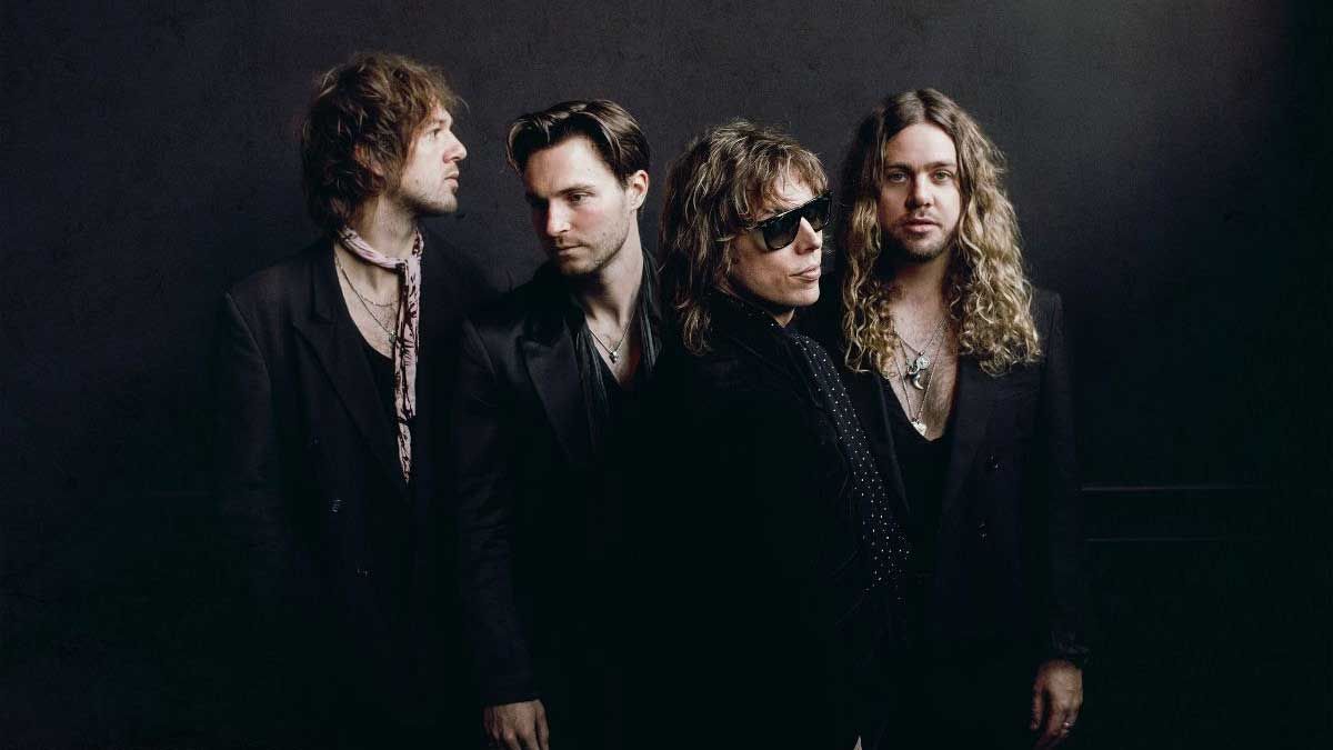 The Struts dressed in black - studio portrait