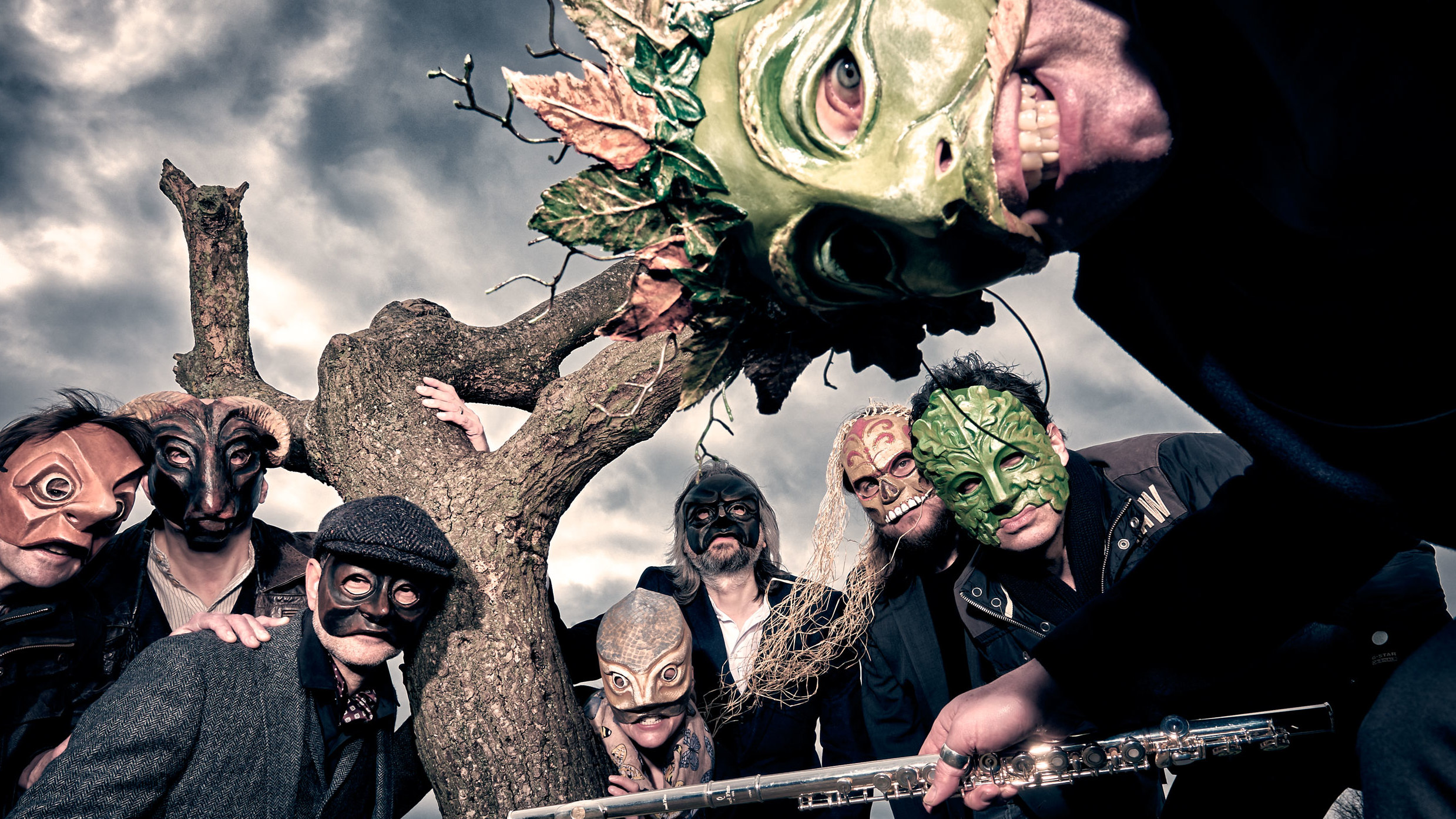 Big Big Train wearing masks to promote their Folklore album