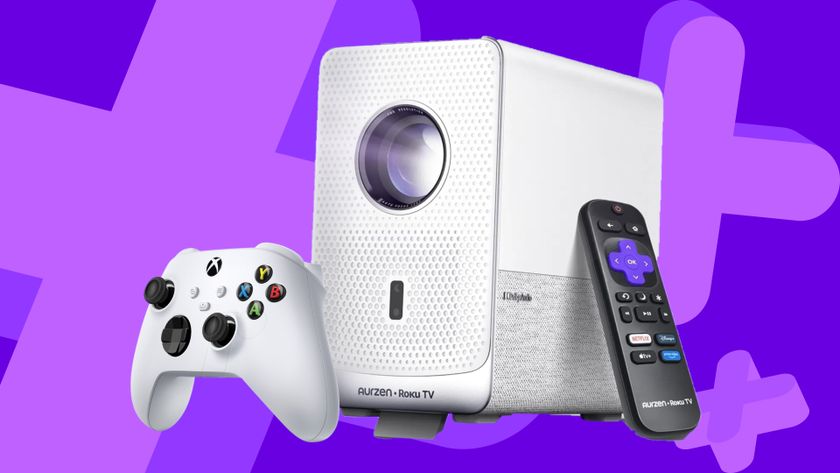 Aurzen Roku projector with an Xbox controller on a purple background