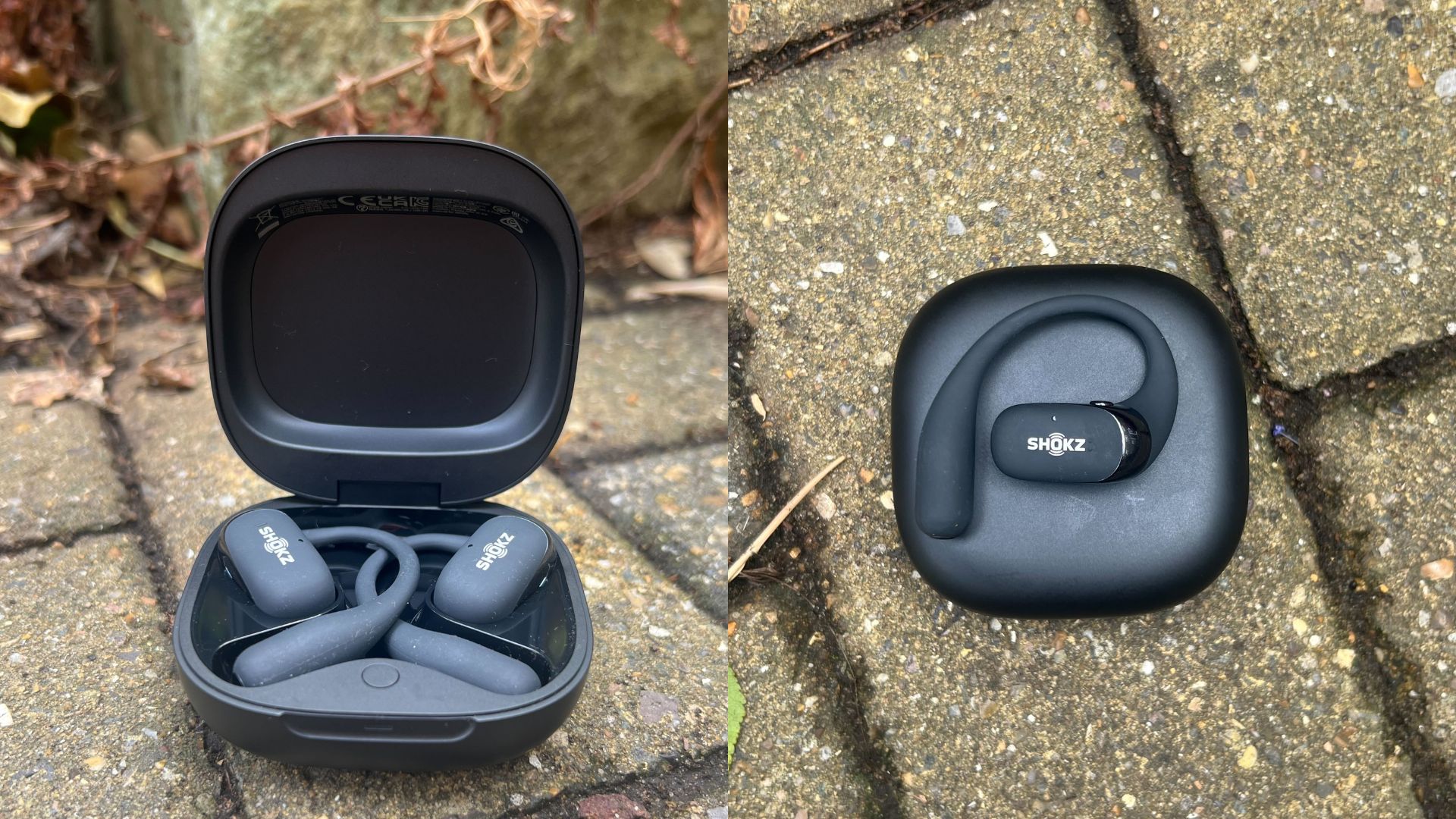 Shokz OpenFit 2+ headphones in case sitting on garden stones