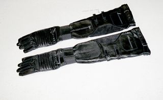 A pair of black Raf Simons leather gloves