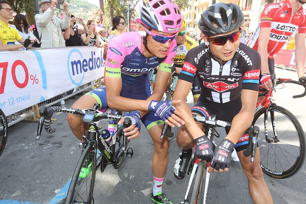 Chinese riders Xu Gang and Cheng Ji