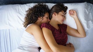 How to sleep for longer: Image shows couple asleep