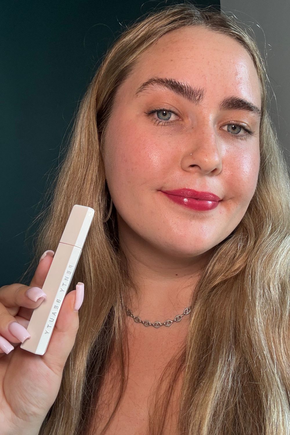 Amelia wearing Fenty BeautyPoutsicle Hydrating Lip Stain
