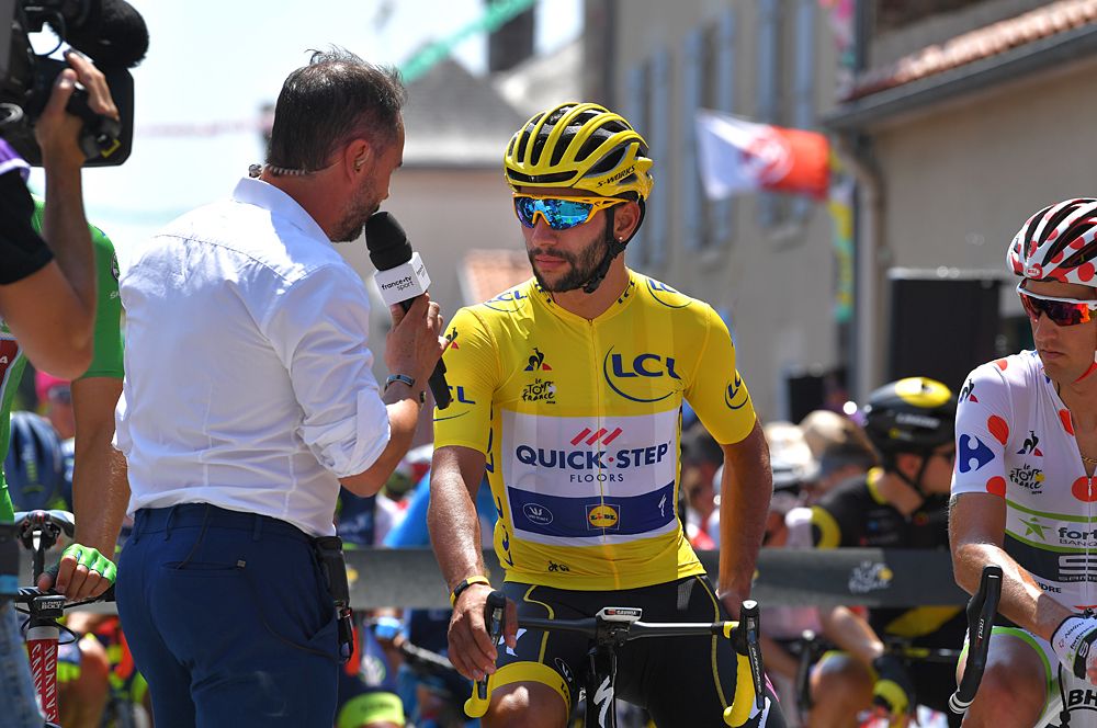 Fernando Gaviria (Quick-Step Floors) wears the yellow jersey at the start of stage 2 of the Tour de France