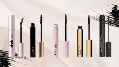 best mascaras for sensitive eyes from UK Lash, Merit, Glossier, Hourglass and bareminerals on a pale pink background with mascaras swatches