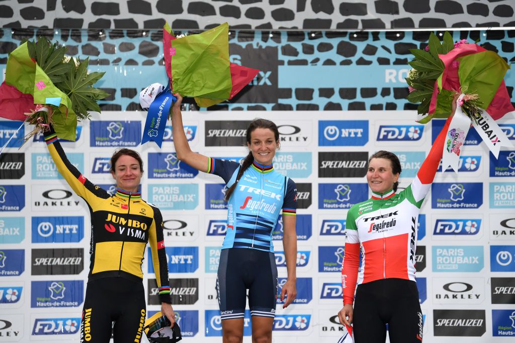 ROUBAIX FRANCE OCTOBER 02 LR Marianne Vos of Netherlands and Jumbo Visma Team on second place stage winner Elisabeth DeignanArmitstead of United Kingdom and Team Trek Segafredo and Elisa Longo Borghini of Italy and Team Trek Segafredo on third place pose with trophies on the podium during the podium ceremony after the 1st ParisRoubaix 2021 Womens Elite a 1164km race from Denain to Roubaix ParisRoubaixFemmes ParisRoubaix on October 02 2021 in Roubaix France Photo by Tim de WaeleGetty Images