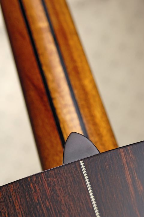 The three-piece laminate neck is nicely ingrained with ebony