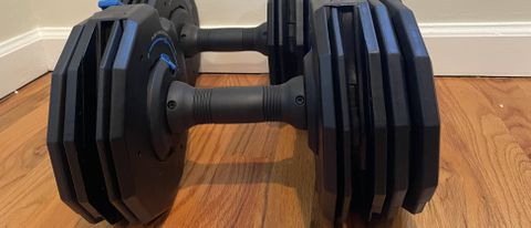 NordicTrack Select-A-Weight Dumbbells on hardwood floor