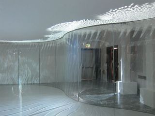 Pavilion with curved glass