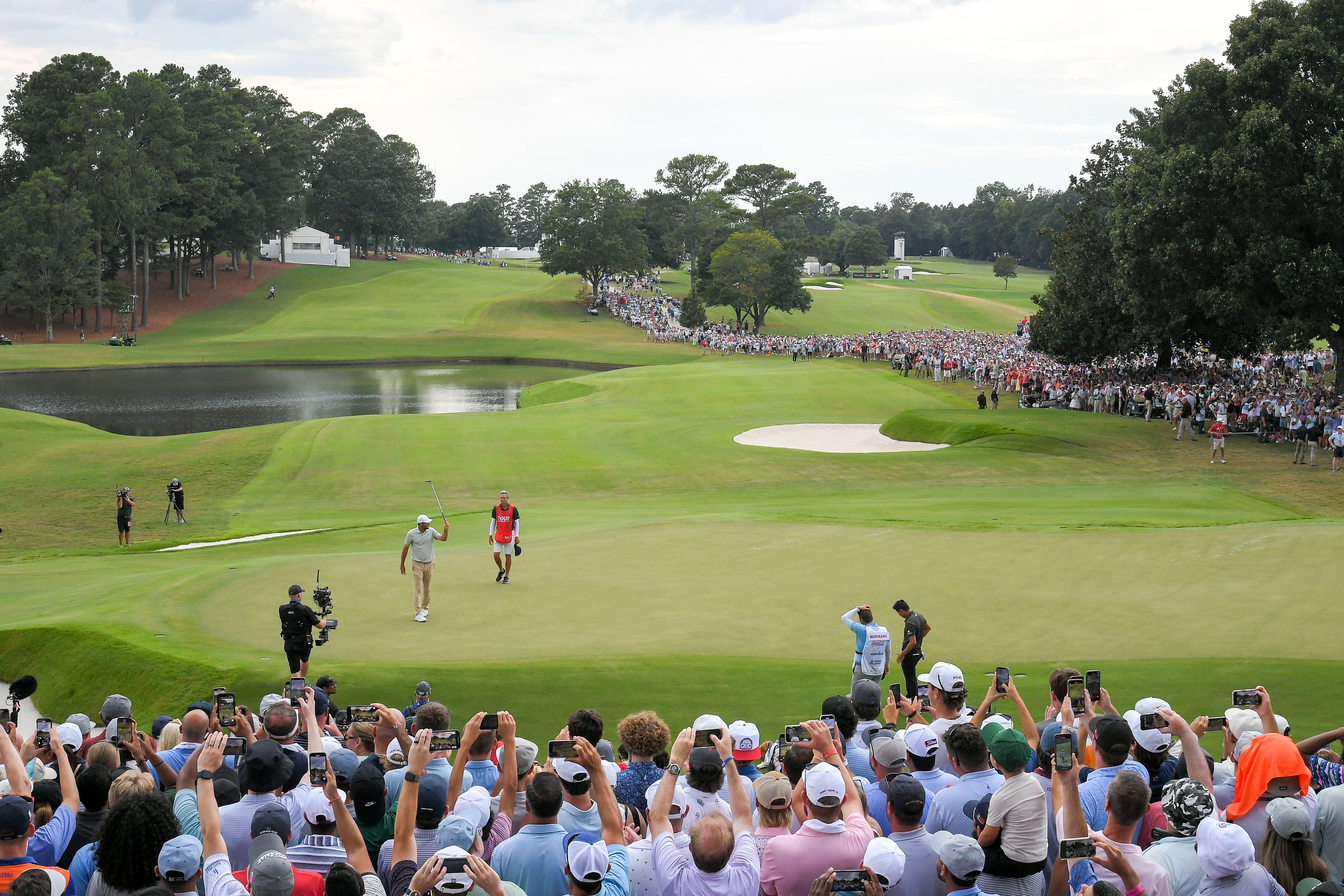 Scottie Scheffler on the 18th green at East Lake