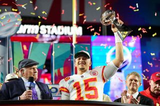 Chiefs QB Patrick Mahomes with trophy after Super Bowl LVII