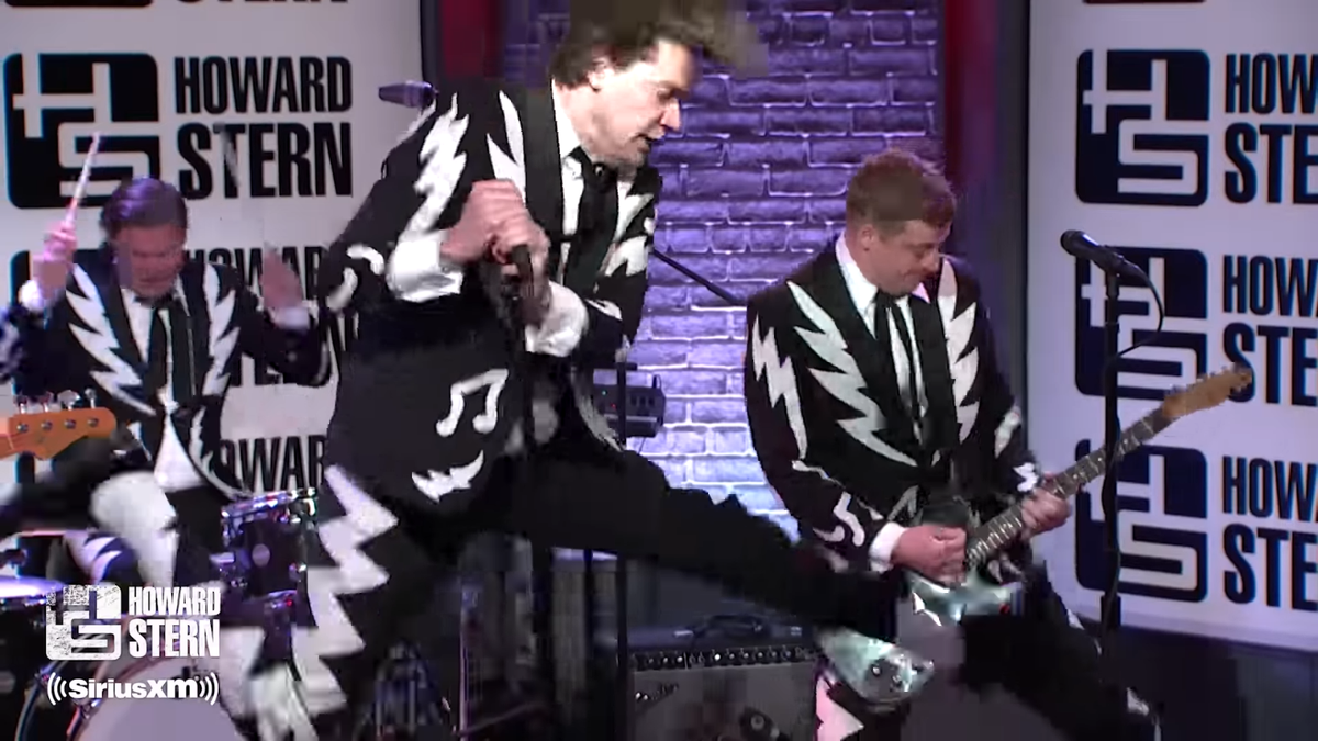 A picture of The Hives performing on Howard Stern&#039;s SiriusXM show